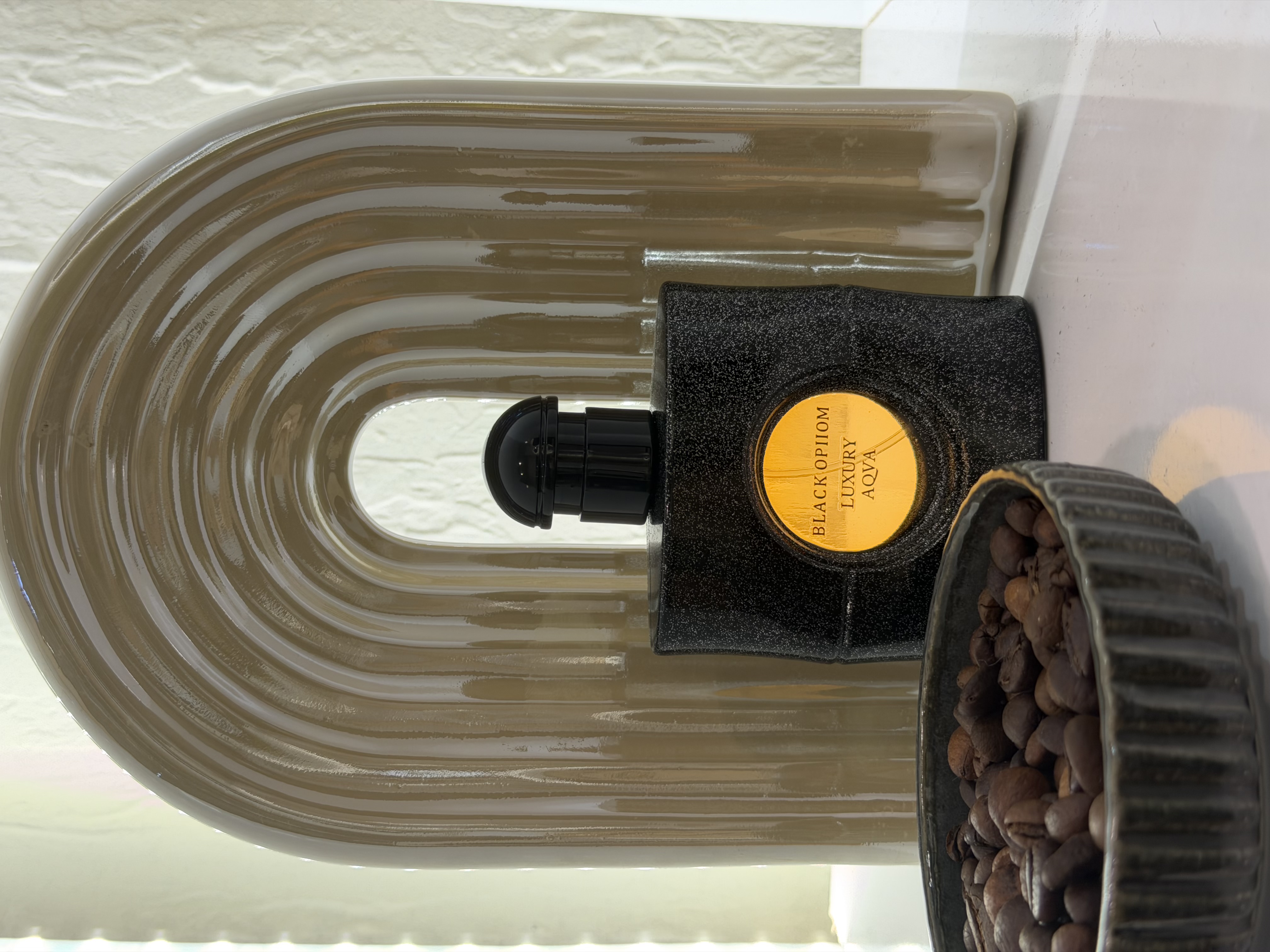 عطر  بلک اوپیوم  ۵۰ میل لاکچری اکوا